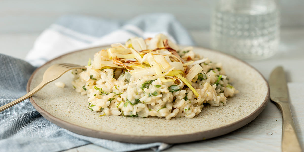 Kruidenrisotto met waterkers en gebakken prei