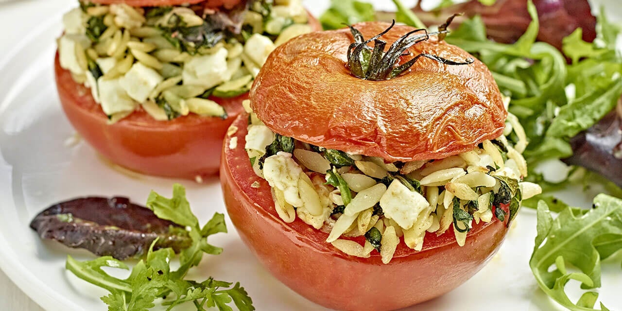 Œuf poché sur un lit de lentilles, roquette et patates douces