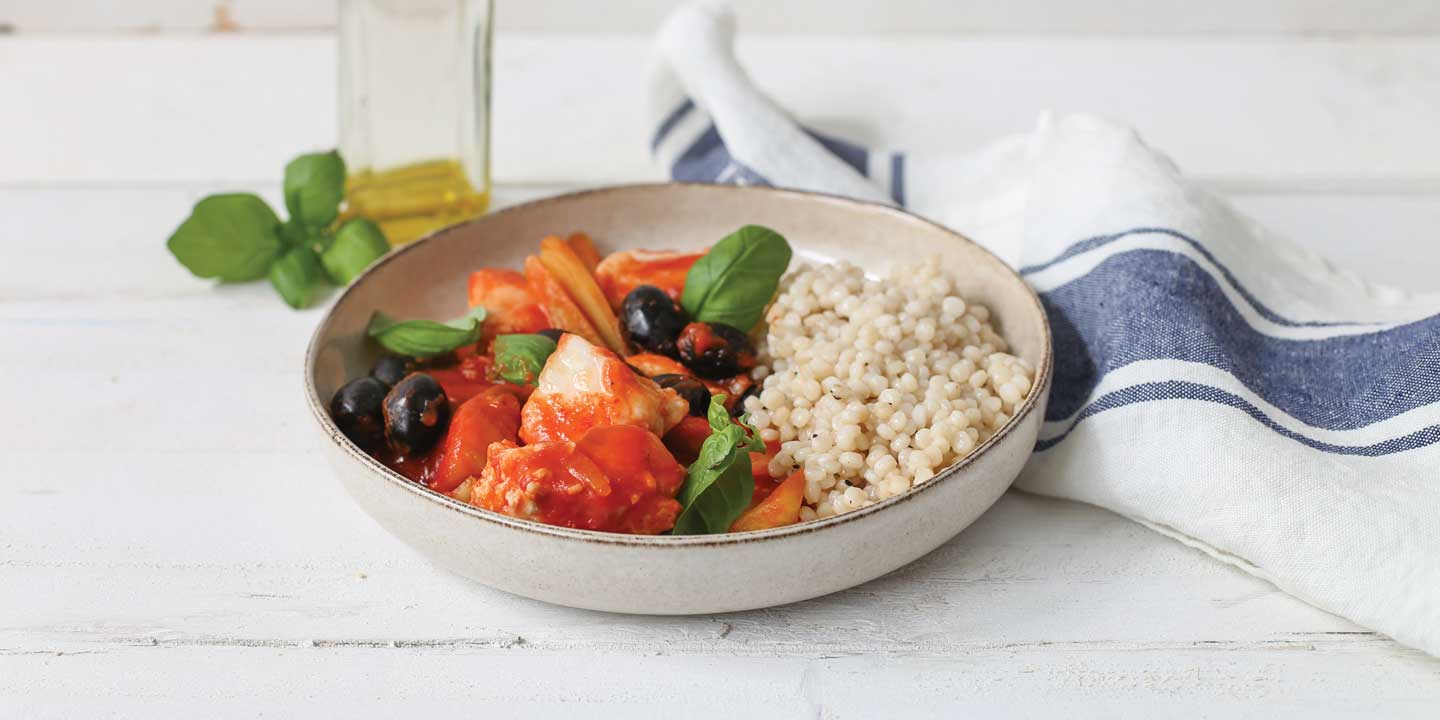 Ragoût de poisson à l'italienne et couscous perlé