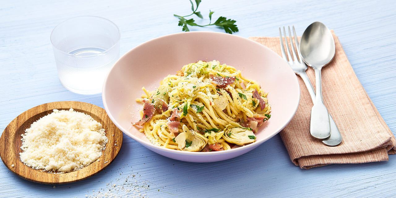 Spaghetti met artisjok, boerenkool en Italiaanse ham