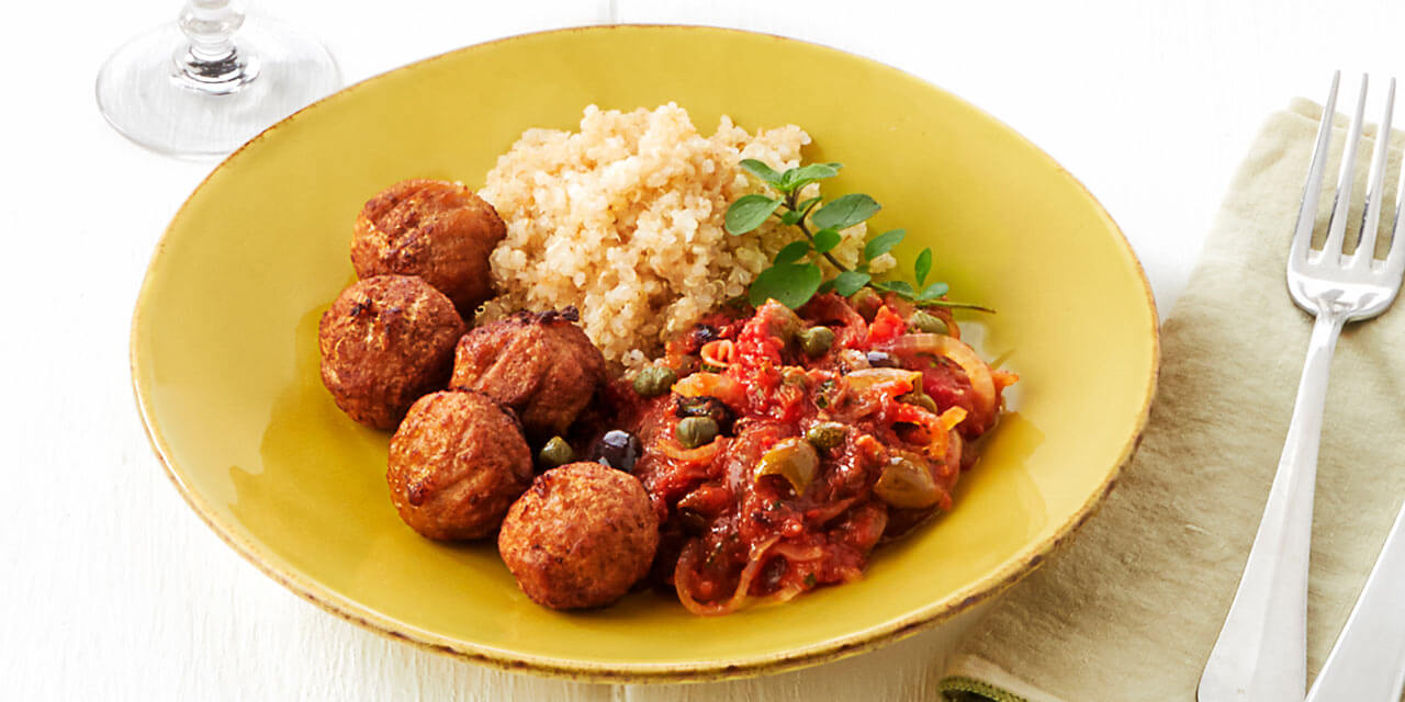 Vegetarische balletjes, puttanescasaus, quinoa		