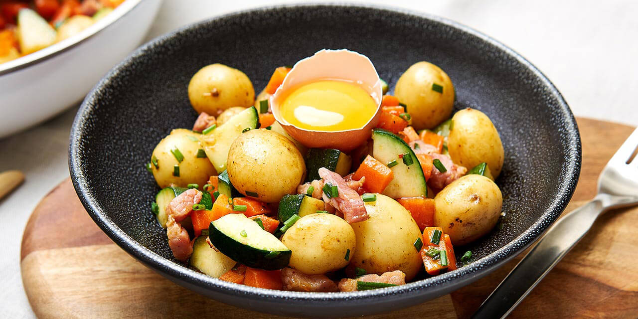 Pommes de terre au lard et à la courgette